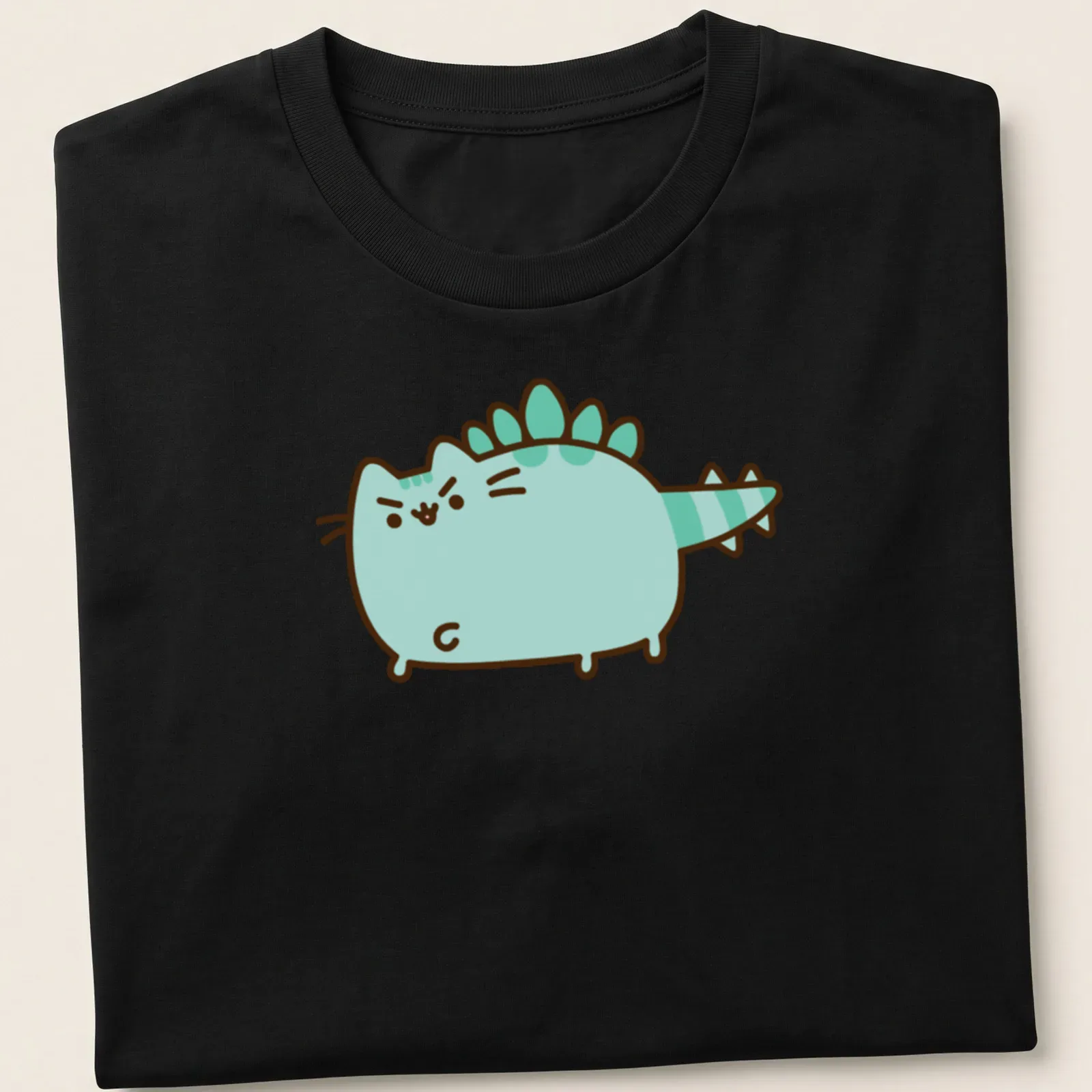 Kawaii line-art Dinosaur Pusheen character in light blue and green — printed on a unisex t-shirt
