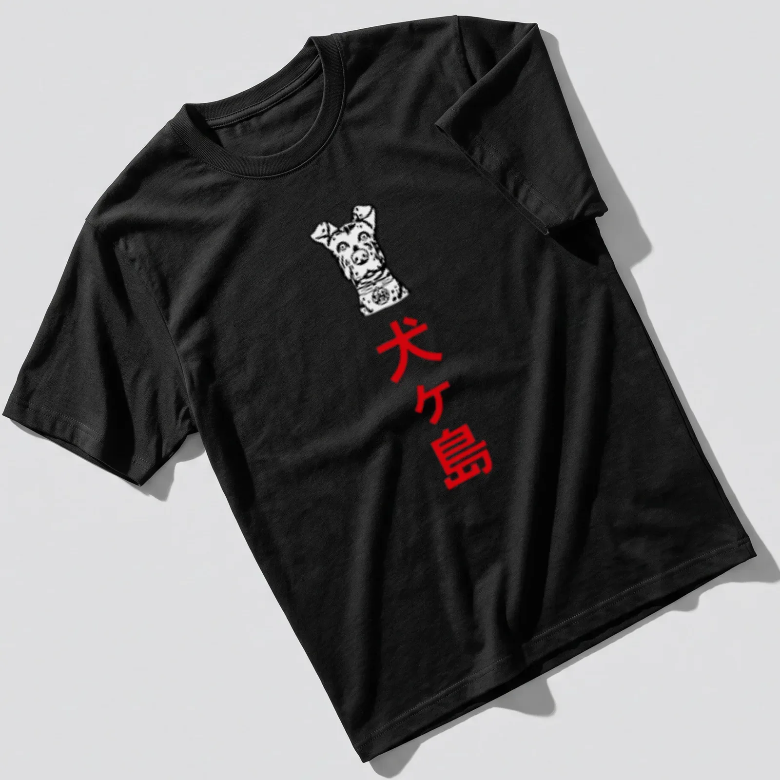 Illustrative T-shirt featuring a playful dog and the text 犬ヶ島 in bold font — printed on a unisex t-shirt