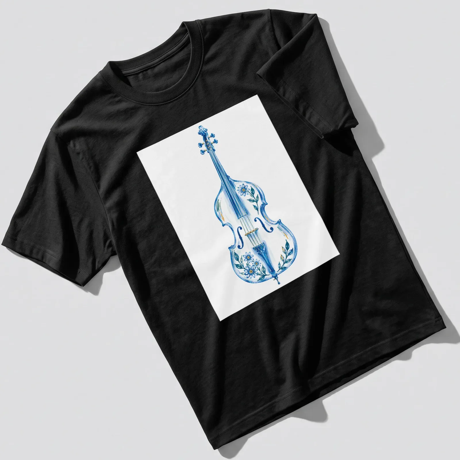 Watercolor illustration of a double bass surrounded by flowers in blue, green, and yellow — printed on a unisex t-shirt