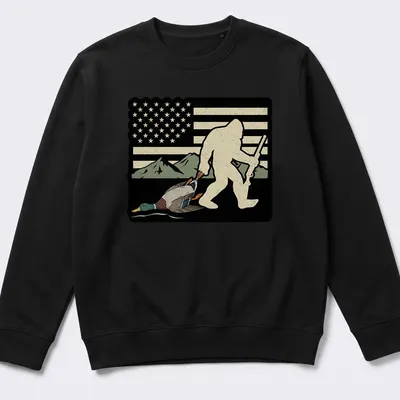 Vintage distressed Bigfoot Sasquatch holding a duck in a humorous style — printed on a unisex sweatshirt