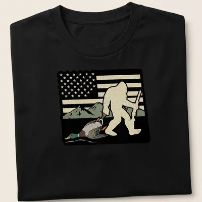 Vintage distressed Bigfoot Sasquatch holding a duck in a humorous style — printed on a unisex t-shirt