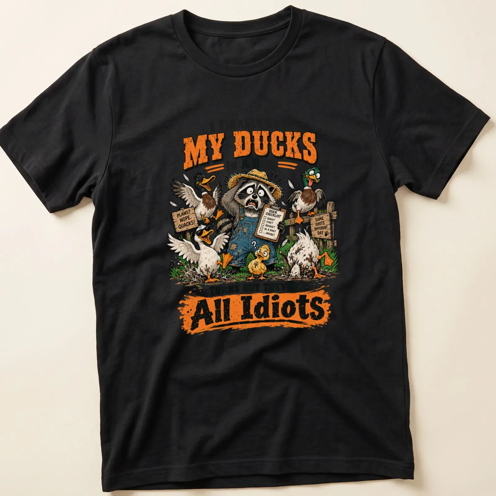 Cartoon illustration of a raccoon with ducks, humorously expressing chaos. — printed on a unisex t-shirt