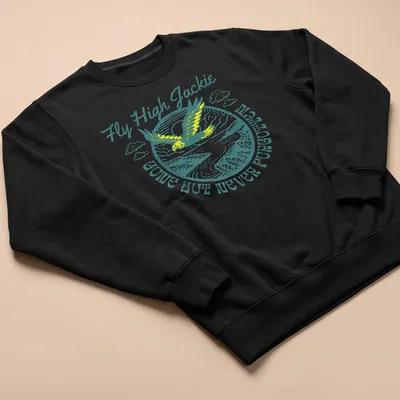 Vintage illustration of an eagle with text 'Fly High Jackie GONE BUT NEVER FORGOTTEN' in teal and yellow — printed on a unisex sweatshirt