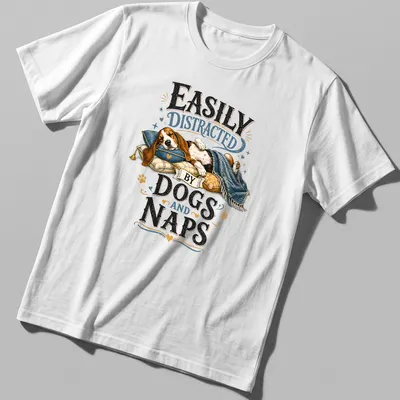 Whimsical illustration of a sleeping beagle with the text 'Easily Distracted By Dogs And Naps' — printed on a unisex t-shirt