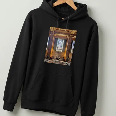 Modern architectural print of an interior scene with people in gold, brown, green, blue, and purple — printed on a unisex hoodie