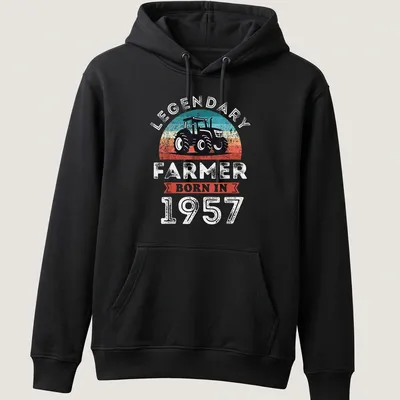Retro distressed t-shirt with tractor and text for a legendary farmer born in 1957 — printed on a unisex hoodie