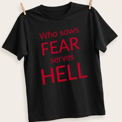 Bold typography t-shirt featuring the phrase about fear in red and white — printed on a unisex t-shirt