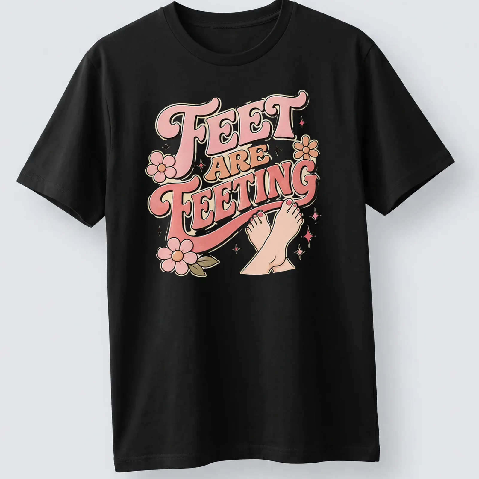 Playful retro Feet Are Feeting t-shirt with colorful lettering and feet illustration — printed on a unisex t-shirt