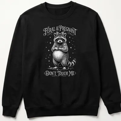 Vintage illustration of a raccoon with text 'Feral & Pregnant Don't Touch Me' in black and white — printed on a unisex sweatshirt
