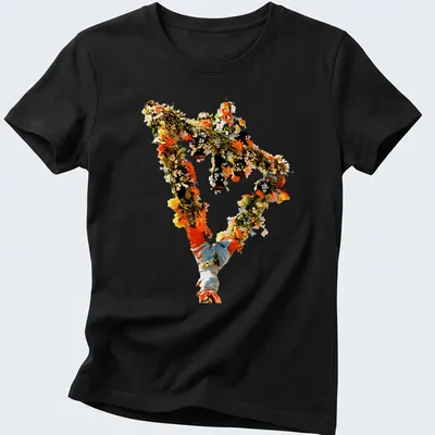 Vintage floral design with the text 'The Devil Wears Prada' in a playful style. — printed on a women's shirt
