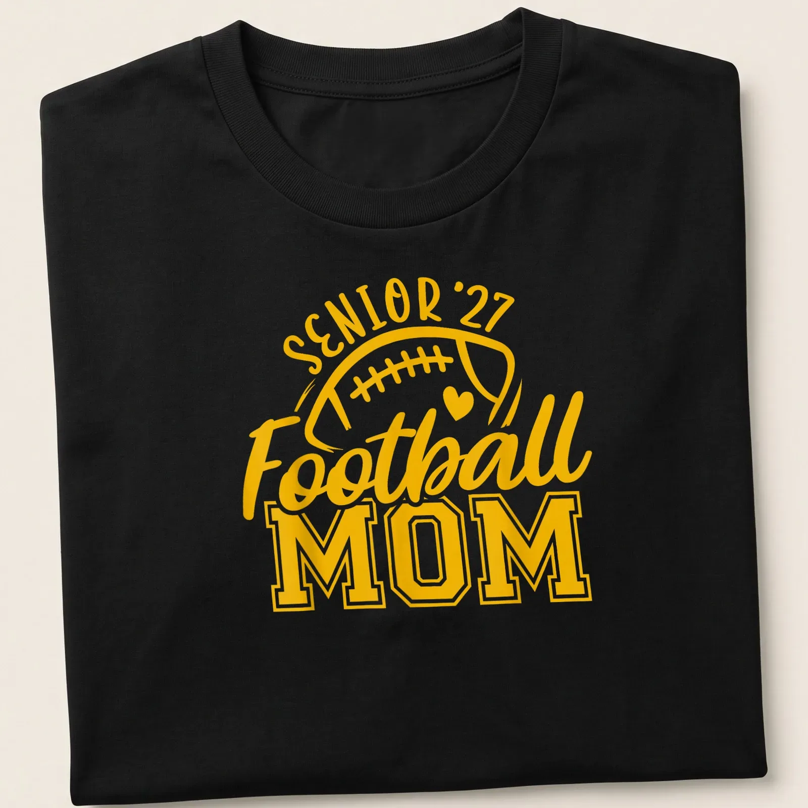 Bold typography T-shirt for Football Moms featuring 'Senior 27' text — printed on a unisex t-shirt