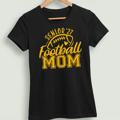Bold typography T-shirt for Football Moms featuring 'Senior 27' text — printed on a women's shirt
