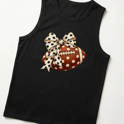 Realistic football with a polka dot bow graphic in brown and cream — printed on a tank top