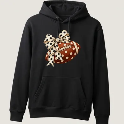 Realistic football with a polka dot bow graphic in brown and cream — printed on a unisex hoodie