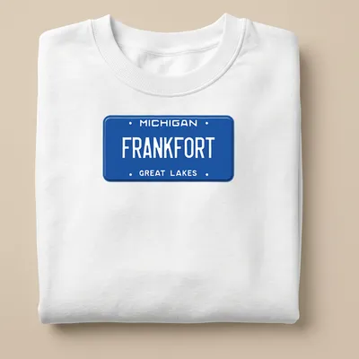 Vintage graphic t-shirt featuring a Michigan license plate design in blue and white. — printed on a unisex sweatshirt
