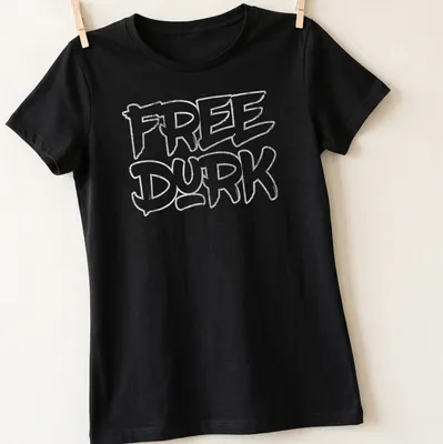 Bold graffiti style shirt with the phrase Free Durk in white on gray — printed on a women's shirt