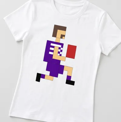 Pixel art of a Fremantle footballer in a purple uniform with black outlines — printed on a women's shirt