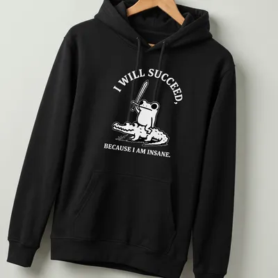 Kawaii line-art shirt depicting a frog riding a crocodile with motivational text — printed on a unisex hoodie