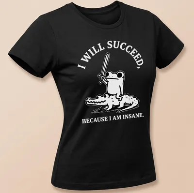 Kawaii line-art shirt depicting a frog riding a crocodile with motivational text — printed on a women's shirt