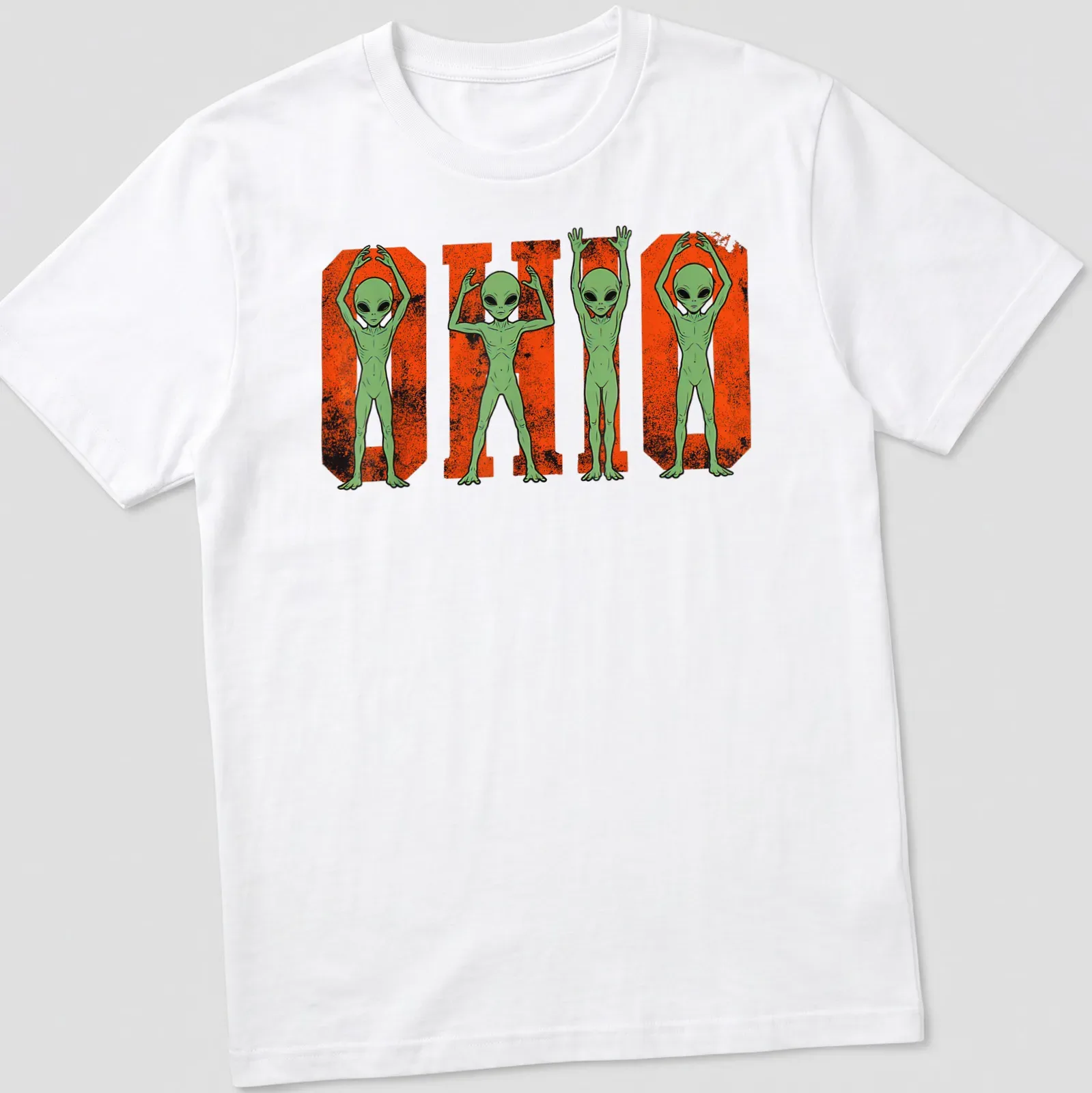 Cartoon aliens around the text 'O H I O' in a vintage Halloween style — printed on a unisex t-shirt