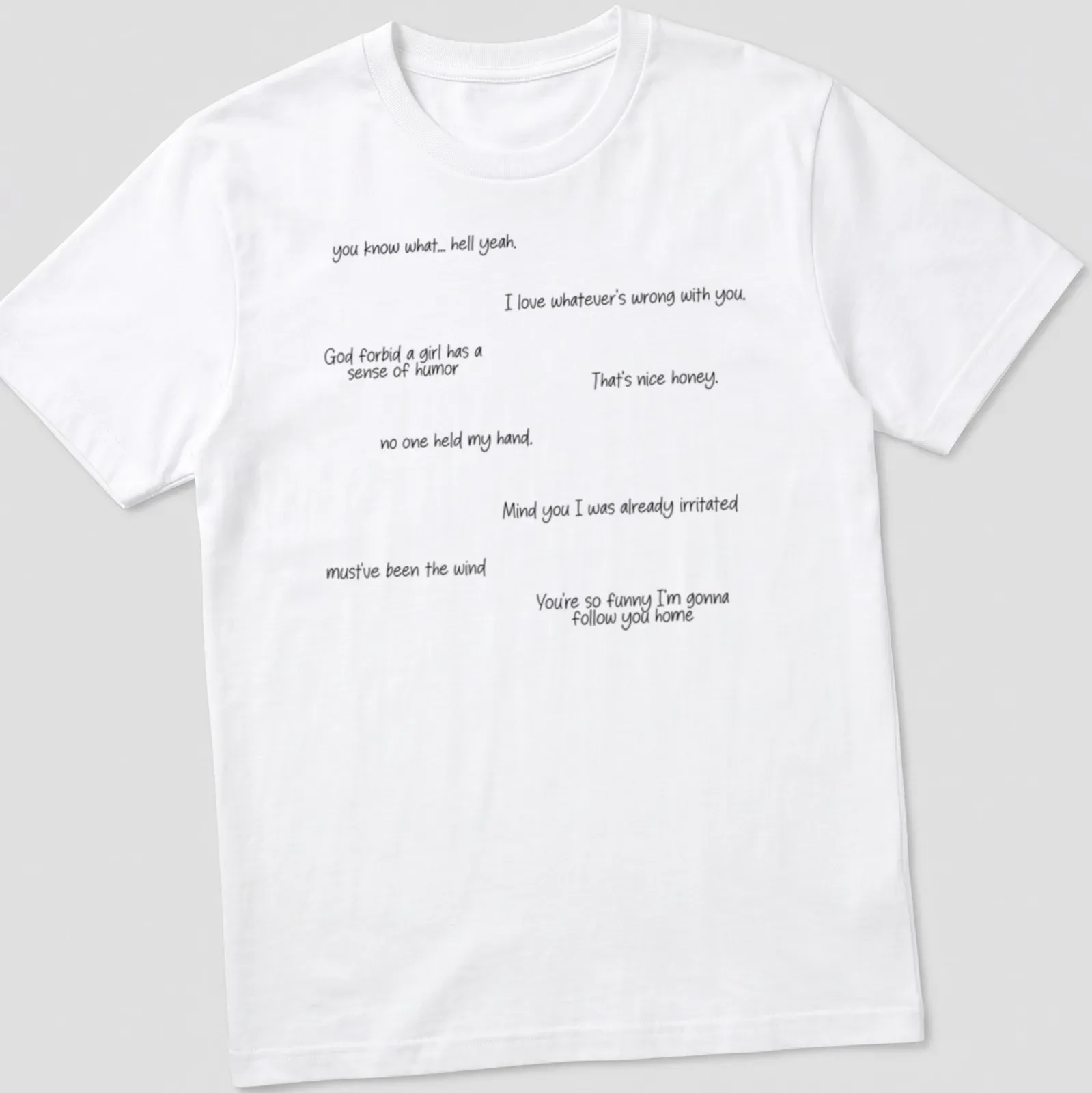 Handwritten humorous comments printed in black on a white — printed on a unisex t-shirt