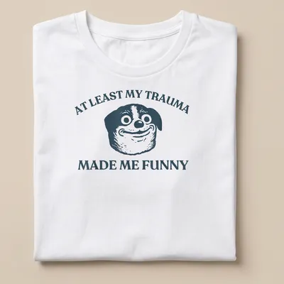 Funny T-shirt featuring a cartoon dog and humorous text about trauma.