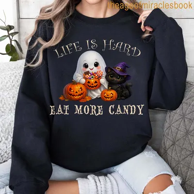 Cute cartoon ghost and black cat with Halloween-themed text — printed on a sweatshirt