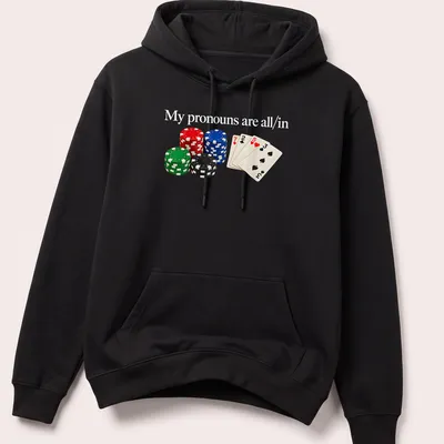 Realistic poker design with chips and cards featuring text about pronouns. — printed on a unisex hoodie