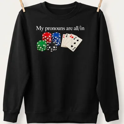Realistic poker design with chips and cards featuring text about pronouns. — printed on a unisex sweatshirt