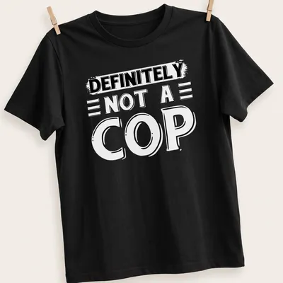 Bold typography shirt stating 'DEFINITELY NOT A COP' in black and white