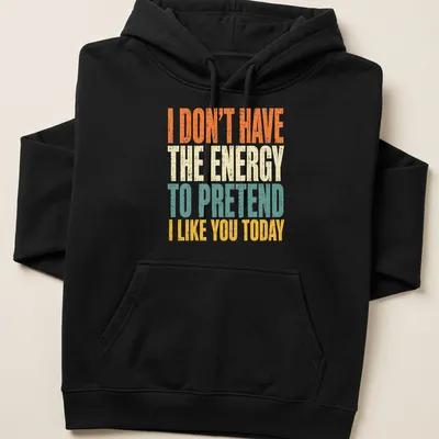 Bold distressed tee with humorous text about social energy levels — printed on a unisex hoodie