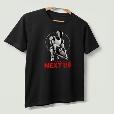 Silhouette of a futuristic humanoid robot with bold text saying 'THE NEXT US' in black, white, and red. — printed on a unisex t-shirt (angled view)
