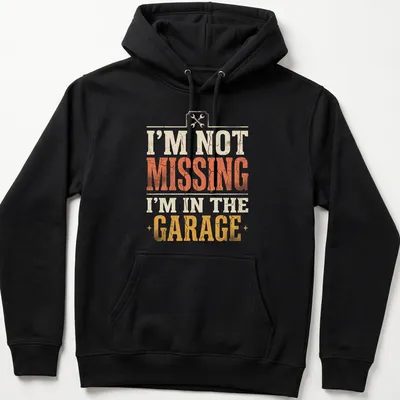 Vintage distressed t-shirt with humorous text about being in the garage — printed on a unisex hoodie