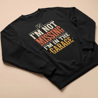 Vintage distressed t-shirt with humorous text about being in the garage — printed on a unisex sweatshirt