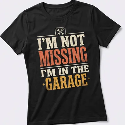 Vintage distressed t-shirt with humorous text about being in the garage — printed on a women's shirt