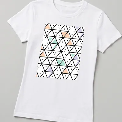 Modern seamless geometric triangle pattern in black, white, peach, mint green, and lavender. — printed on a women's shirt