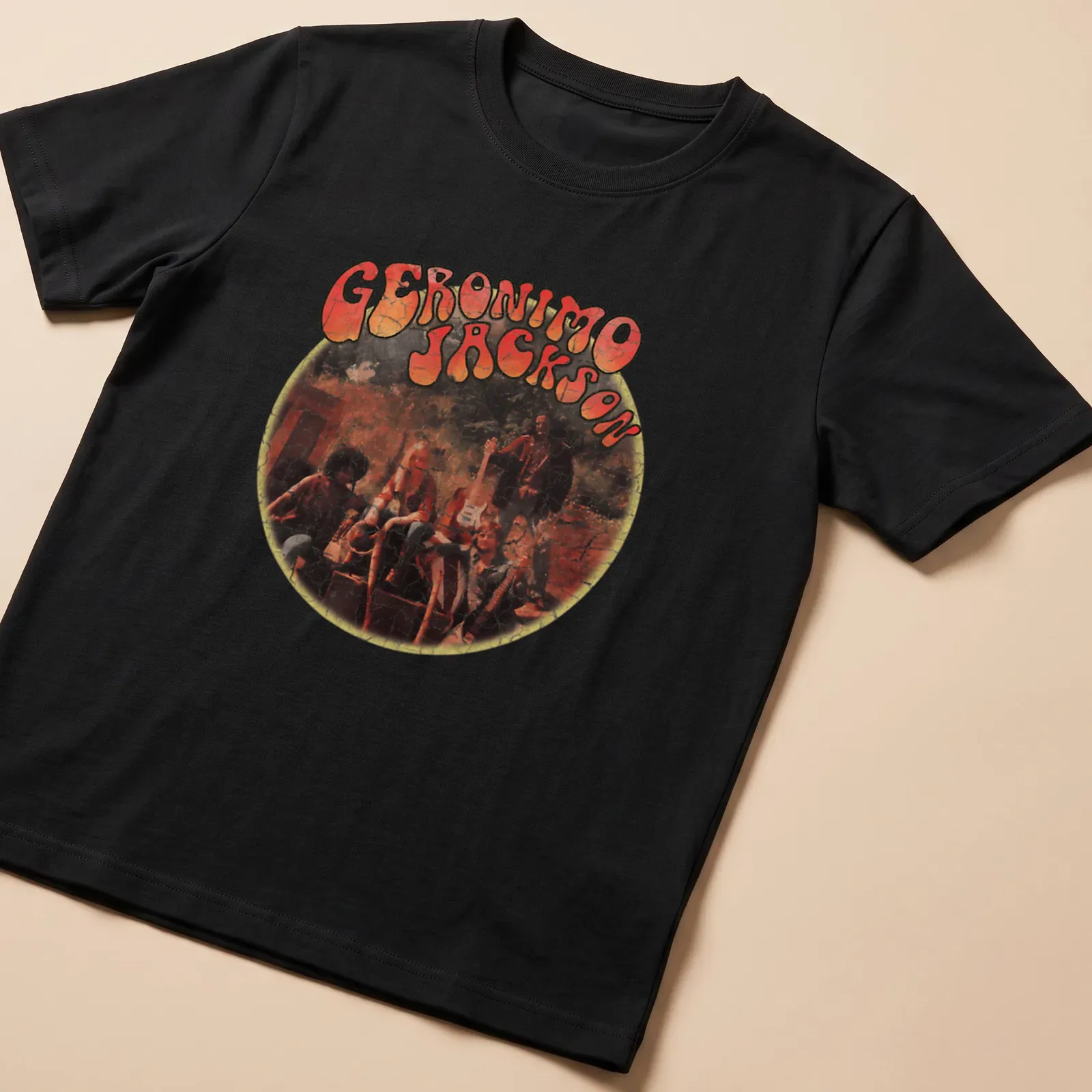 Retro distressed t-shirt featuring the name 'Geronimo Jackson' in bold lettering — printed on a unisex t-shirt
