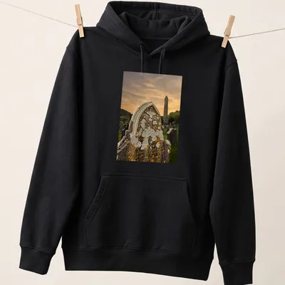 Photographic print of Glendalough Monastery graveyard with 'INRI' text — printed on a unisex hoodie