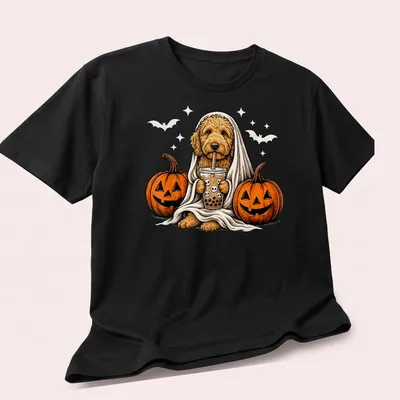Cartoon Goldendoodle in a ghost costume with a boba drink in Halloween colors — printed on a unisex t-shirt (angled view)