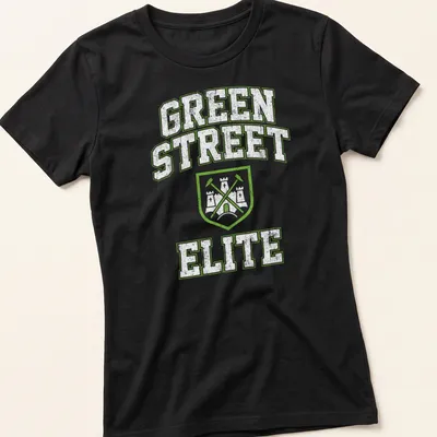 Vintage distressed t-shirt featuring a shield with crossed tools and 'Green Street Elite' text — printed on a women's shirt
