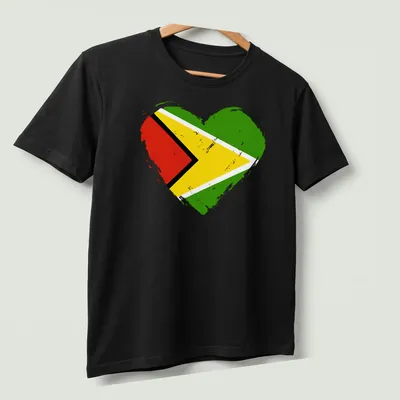 Distressed heart design showcasing the Guyana flag colors — printed on a unisex t-shirt (angled view)