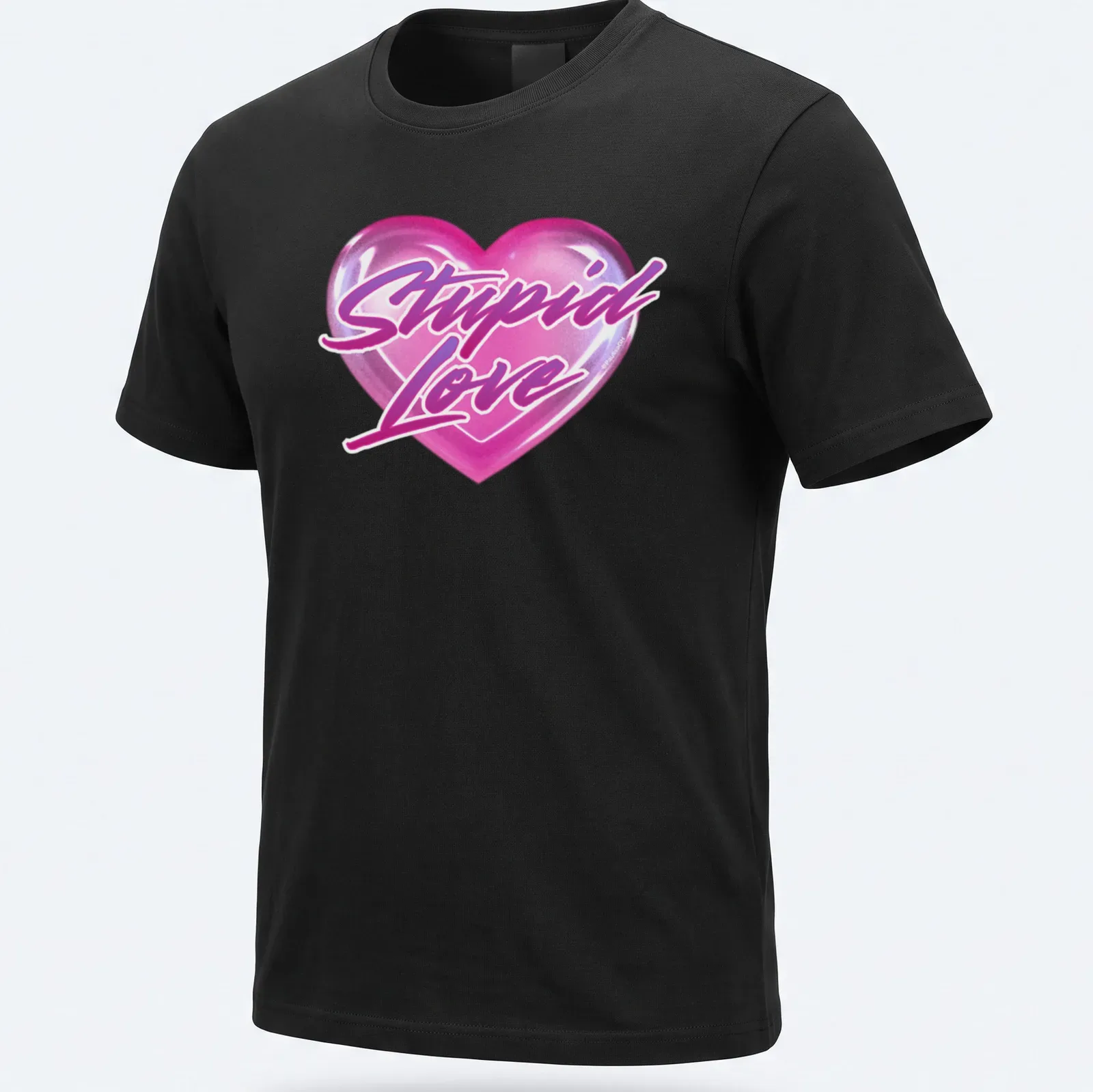 Glossy heart graphic with the text 'Stupid Love' in playful lettering — printed on a unisex t-shirt