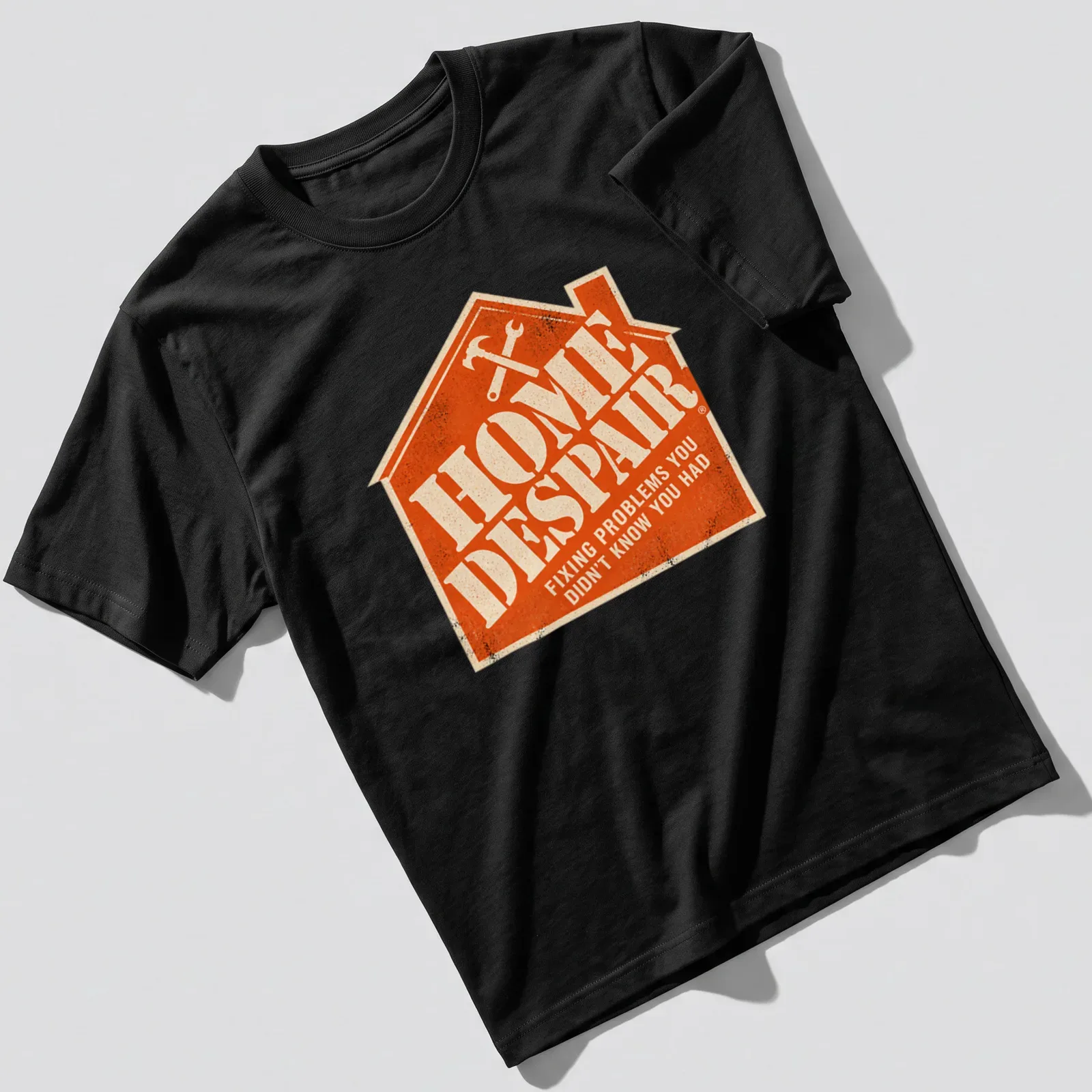 Vintage distressed shirt featuring a humorous design about home repairs with tools and text. — printed on a unisex t-shirt