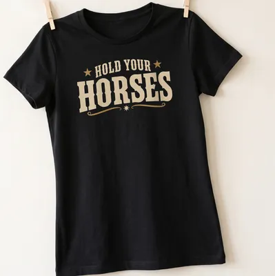 Western vintage shirt with humorous text and horse graphics — printed on a women's shirt