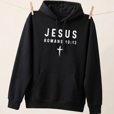 Bold typography t-shirt featuring Jesus and Romans 10:13 in white text — printed on a unisex hoodie