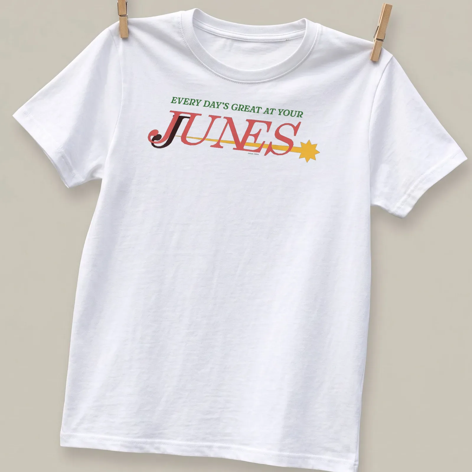 Bold retro design featuring the phrase Every Day's Great At Your Junes in vibrant colors — printed on a unisex t-shirt