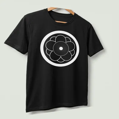 Traditional Japanese Kamon symbol in red, black, and white on — printed on a unisex t-shirt (angled view)