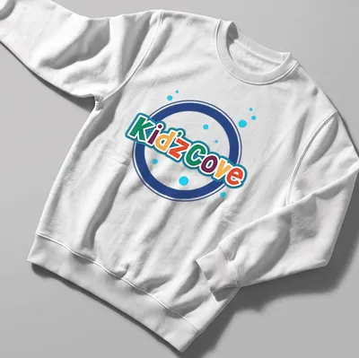 Colorful Kidz Cove logo t-shirt with playful typography in vibrant colors — printed on a unisex sweatshirt