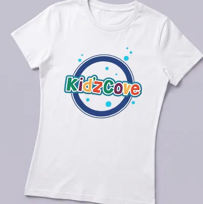 Colorful Kidz Cove logo t-shirt with playful typography in vibrant colors — printed on a women's shirt