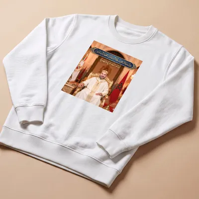 Elegant portrait of King Mohammed VI with celebratory text in gold and green — printed on a unisex sweatshirt